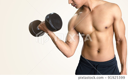 Handsome muscular man posing and flexing muscles on white background. Handsome muscular man posing and flexing muscles on white background. 91925399