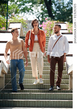 Adult Friends Walking Outdoor Adult Friends Walking Outdoor 91926305