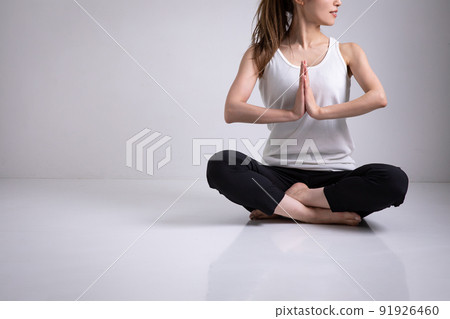 Woman doing yoga Woman doing yoga 91926460