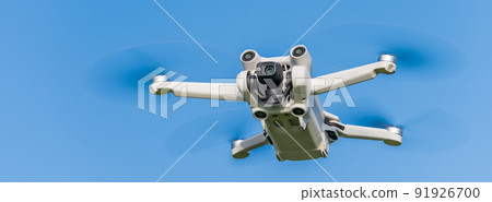 Drone in flight blue sky 91926700