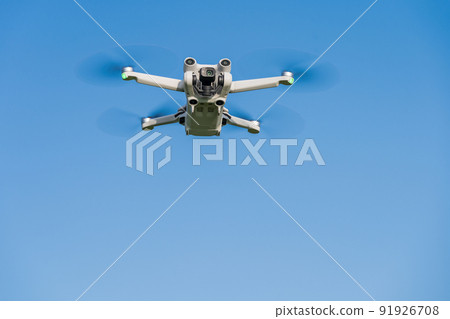 Drone in flight blue sky 91926708
