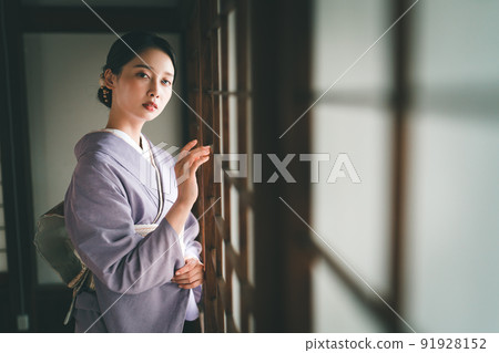 Woman in summer kimono Woman in summer kimono 91928152