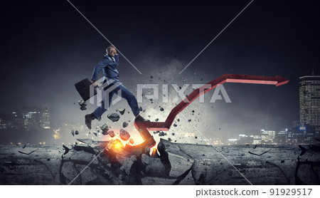 Determined businessman on his way to success leaving fire trails Determined businessman on his way to success leaving fire trails 91929517