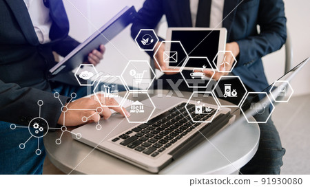 Business team working virtual tablet to emissions carbon CO2 climate change to limit global warming.Sustainable development and green business concept. Business team working virtual tablet to emissions carbon CO2 climate change to limit global warming.Sustainable development and green business concept. 91930080