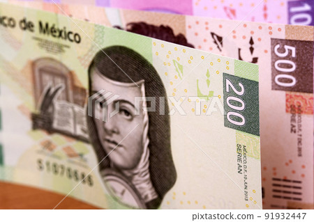 Mexican peso a business background. Mexican peso a business background. 91932447