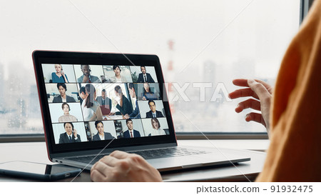 Females attending a multinational video conference Females attending a multinational video conference 91932475
