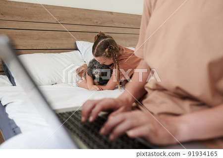 Little Girl Hugging Dog on Bed Little Girl Hugging Dog on Bed 91934165