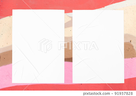 colorful urban wall texture with two wrinkled glued poster templates 91937828