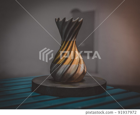 Object printed from metal powder on metal 3d printer. Object printed in laser sintering machine. Modern 3D printer printing from metal powder. Progressive additive DMLS, SLM, SLS technology 91937972