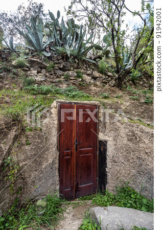 Natural caves in the slopes of the Barranco de Guayadeque in the Aguimes valley on the Canary Island, Spain 91942001