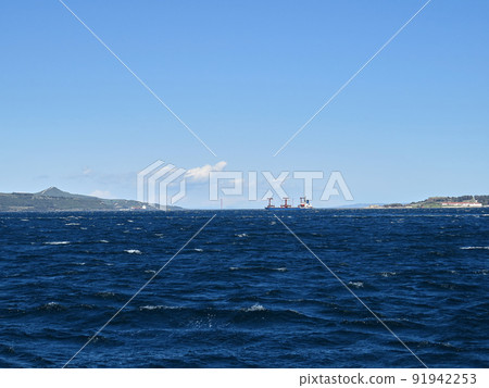 Cargo ship crossing the strait 1915 Canakkale Bridge in background 91942253