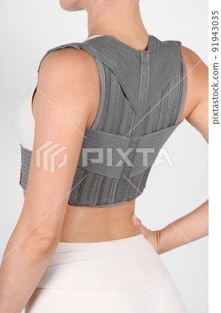 Posture Corrector isolated on white. Orthopedic lumbar support products. Lumbar Support Belts For Back Clavicle Spine. Lumbar Waist Support Belt Strong Lower Back Brace Support. Lumbar brace. 91943035