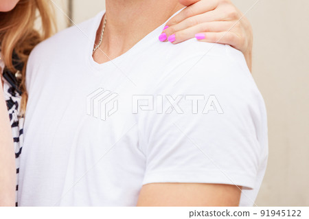 Girl embracing her boyfriend. 91945122