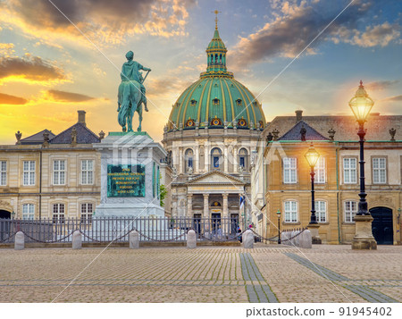 Frederik's Church known as The Marble Church and Amalienborg palace with the statue of King Frederick V. Amalienborg is the home of the Danish royal family Frederik's Church known as The Marble Church and Amalienborg palace with the statue of King Frederick V. Amalienborg is the home of the Danish royal family 91945402