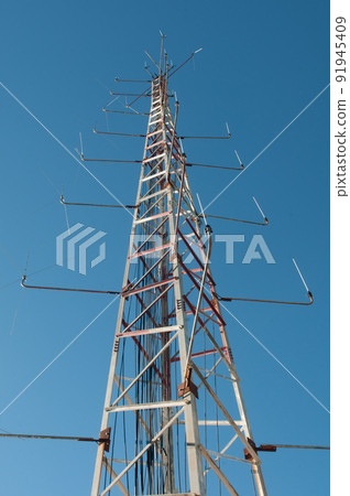 communications antennas in the middle of a forest communications antennas in the middle of a forest 91945409