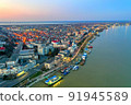Aerial view of Galati City, Romania. Night city lights after sunset at blue hour 91945589