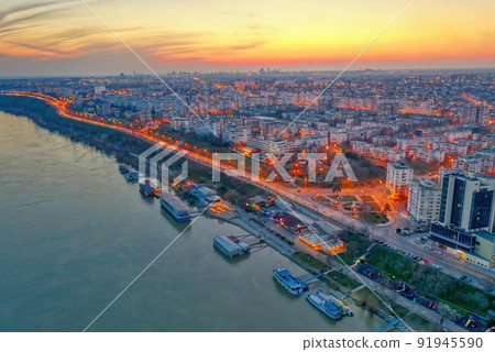 Aerial view of Galati City, Romania. Night city lights after sunset at blue hour Aerial view of Galati City, Romania. Night city lights after sunset at blue hour 91945590