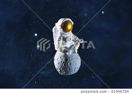 abstract composition astronaut in space sitting on the moon in a pose for meditation abstract composition astronaut in space sitting on the moon in a pose for meditation 91946784