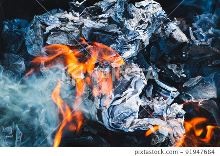 Background with burning paper and coal. Background with burning paper and coal. 91947684