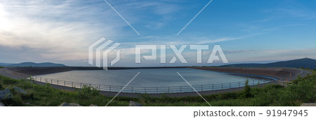Upper water reservoir of the pumped storage hydro power plant Dlouhe Strane in Jeseniky Mountains, Czech Republic. 91947945