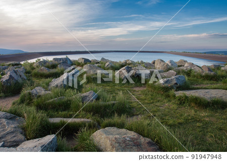 Upper water reservoir of the pumped storage hydro power plant Dlouhe Strane in Jeseniky Mountains, Czech Republic. 91947948