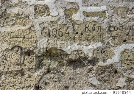a wall of the Akkerman fortress are scratched with date of year 1964, Ukraine 91948544