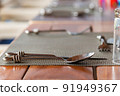 Close-up of spoon on the set table 91949367