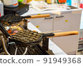 Hong Kong charcoal Waffle is baked on waffle iron machine. 91949368
