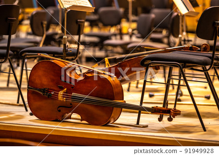 cello on the stage of the Philharmonic during a concert cello on the stage of the Philharmonic during a concert 91949928