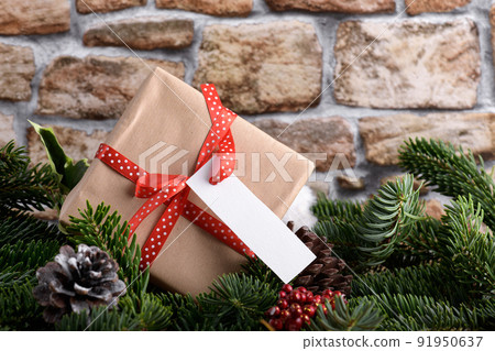 Christmas rectangle strip gift tag mockup with present box, product label mockup, with natural fir tree branch, name tag Christmas rectangle strip gift tag mockup with present box, product label mockup, with natural fir tree branch, name tag 91950637