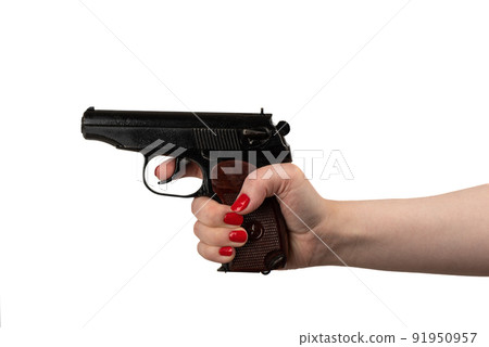 A woman's hand holds a gun aimed at a subjective POV point of view, isolated on a white background. 91950957