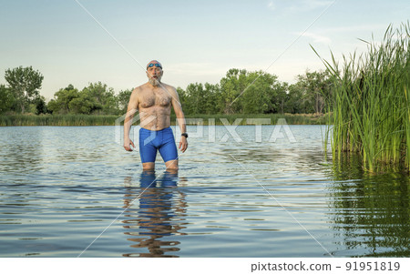 athletic, overweight senior male swimmer athletic, overweight senior male swimmer 91951819
