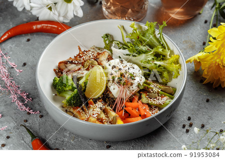 Healthy bowl - quinoa salad with tuna, broccoli, avocado on wooden rustic table. top view 91953084