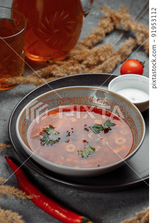 Traditional russian Solyanka or saltwort soup. Selective focus. photo for the menu, traditional food Traditional russian Solyanka or saltwort soup. Selective focus. photo for the menu, traditional food 91953112