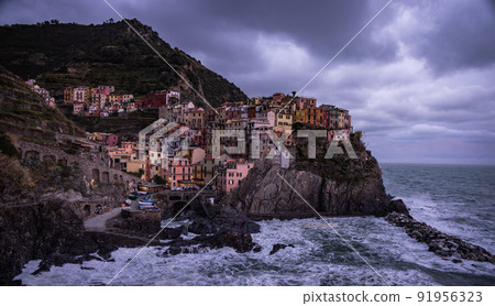 Beautiful Manarola at Cinque Terre Italy in the evening 91956323