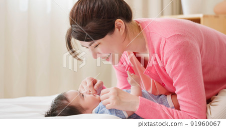 mother with her baby 91960067