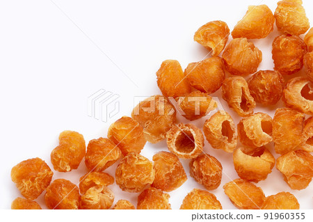 Dried longan on white background. 91960355