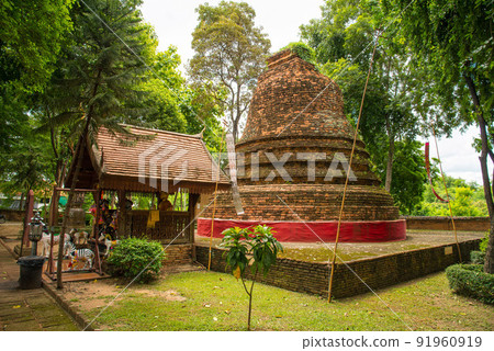 An ancient old brick stupa in Lamphun province of Thailand. An ancient old brick stupa in Lamphun province of Thailand. 91960919