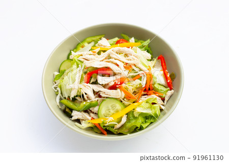 Salad with shredded chicken and vegetables Salad with shredded chicken and vegetables 91961130