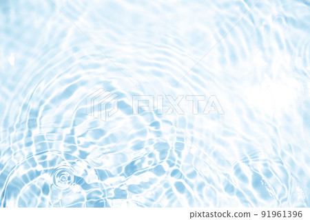 Glittering ripples spreading on the surface of the water 91961396