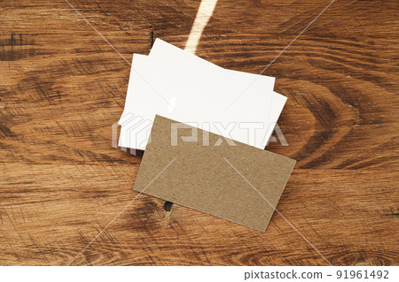 Stacks of businesscards with copy space on wooden background 91961492