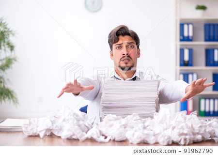 Young male employee in brainstorming concept 91962790