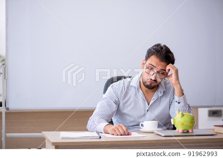 Young male teacher in retirement concept Young male teacher in retirement concept 91962993