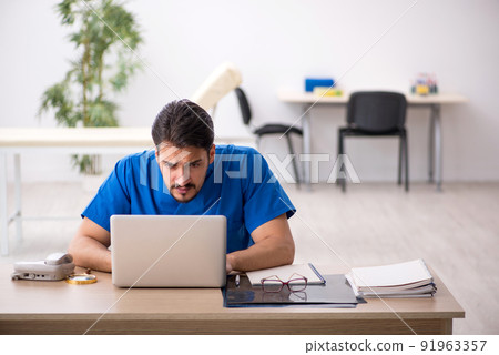 Professional doctor in the hospital working Professional doctor in the hospital working 91963357