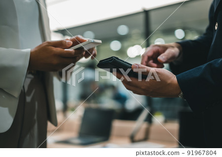 Business person and smartphone 91967804