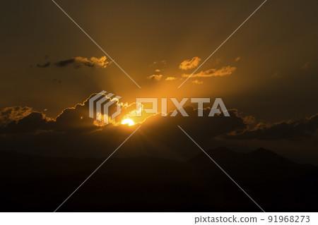 sun setting in the clouds sun setting in the clouds 91968273
