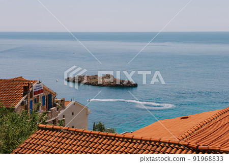 Sveti Stefan is a small island on Adriatic coast of Montenegro near of Budva. Resort is known commercially as Aman Sveti Stefan. Sveti Stefan peninsula on the Adriatic Sea in Budva, Montenegro, Europe Sveti Stefan is a small island on Adriatic coast of Montenegro near of Budva. Resort is known commercially as Aman Sveti Stefan. Sveti Stefan peninsula on the Adriatic Sea in Budva, Montenegro, Europe 91968833