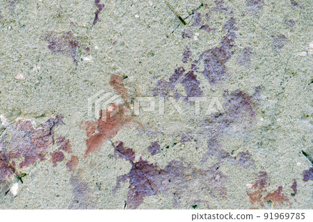 Plastered wall with red paint stones and cracks Plastered wall with red paint stones and cracks 91969785