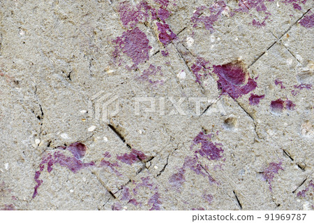 Plastered wall with red paint stones and cracks Plastered wall with red paint stones and cracks 91969787