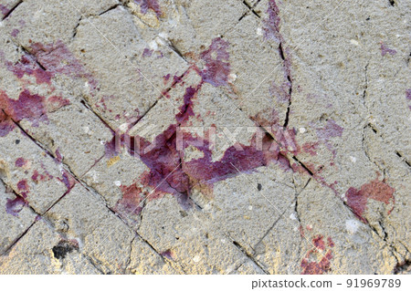 Plastered wall with red paint stones and cracks Plastered wall with red paint stones and cracks 91969789